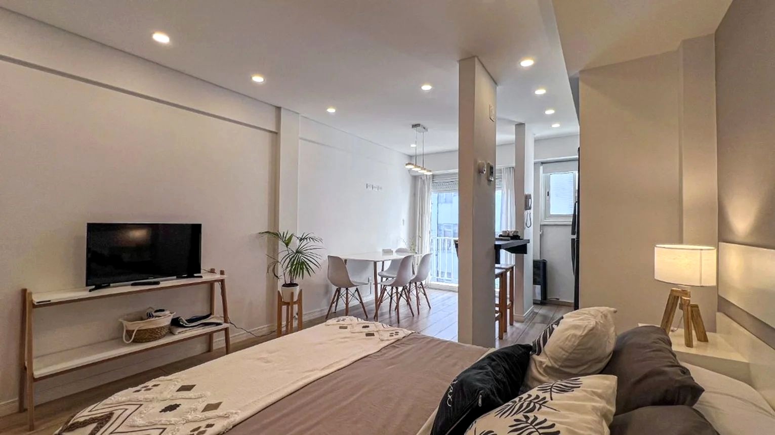 Suite · dormitorio y living